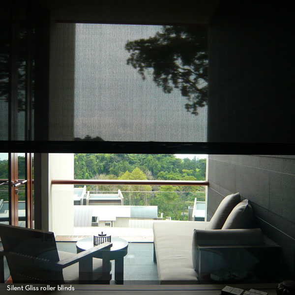 Silent Gliss motorized curtain tracks and “wave” curtain